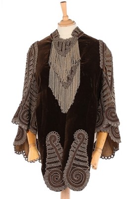 Lot 139 - A beaded brown velvet 'visite', 1880s, the...