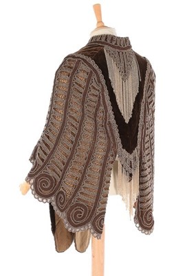 Lot 139 - A beaded brown velvet 'visite', 1880s, the...