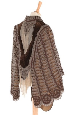 Lot 139 - A beaded brown velvet 'visite', 1880s, the...