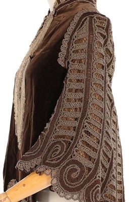 Lot 139 - A beaded brown velvet 'visite', 1880s, the...