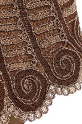 Lot 139 - A beaded brown velvet 'visite', 1880s, the...