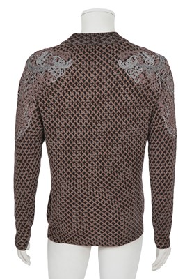 Lot 316 - An Alexander McQueen men's duffle coat and sweater ensemble, 2010-11