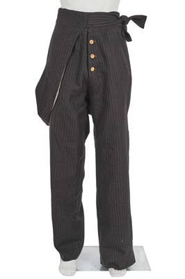 Lot 524 - A rare and early pair of John Galliano pinstriped grey wool trousers, 'Fallen Angels' collection, Spring-Summer 1986