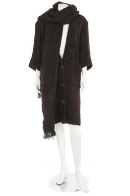 Lot 76 - A Chanel red and black bouclé coat, modern,...