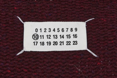 Lot 322 - Three Maison Martin Margiela knitted wool tops, 2000s