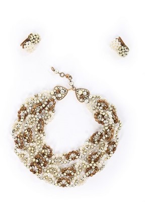 Lot 61 - A Coppola e Toppo beaded triple-strand choker...