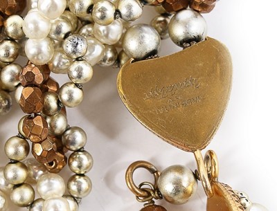 Lot 61 - A Coppola e Toppo beaded triple-strand choker...
