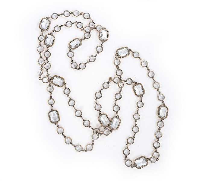 Lot 47 - A Chanel clear glass sautoir, 1981, signed and...
