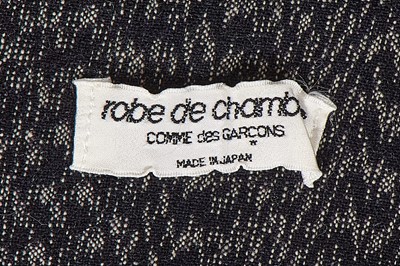 Lot 93 - A Comme des Garçons outsized black and grey wool jacket, probably ‘Twist, Silk + Jersey, Knits (Patchworks)’ collection, Autumn-Winter 1984-85