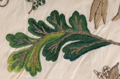 Lot 131 - An embroidered silk apron, English, circa 1730,...