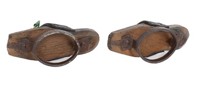 Lot 132 - A rare pair of girl's wooden pattens, second...