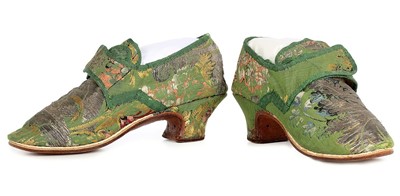 Lot 129 - A pair of shoes of 1730s green brocaded silk,...