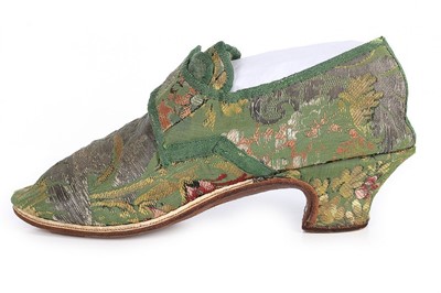 Lot 129 - A pair of shoes of 1730s green brocaded silk,...
