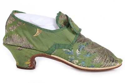 Lot 129 - A pair of shoes of 1730s green brocaded silk,...