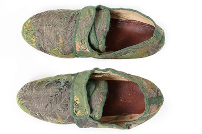 Lot 129 - A pair of shoes of 1730s green brocaded silk,...