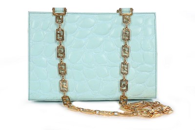 Lot 3 - A Gianni Versace pale-blue faux crocodile...