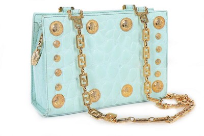 Lot 3 - A Gianni Versace pale-blue faux crocodile...
