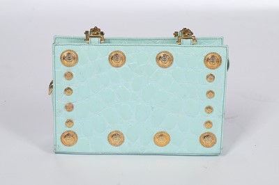 Lot 3 - A Gianni Versace pale-blue faux crocodile...