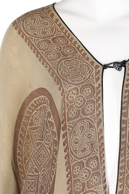 Lot 162 - A Mariano Fortuny stencilled green silk tunic,...