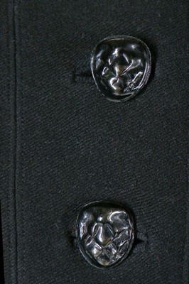 Lot 183 - A Schiaparelli couture black wool...