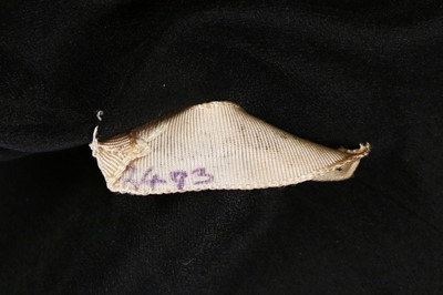 Lot 183 - A Schiaparelli couture black wool...