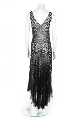 Lot 191 - A black bugle beaded chiffon evening dress,...
