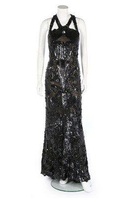 Lot 188 - An ornately sequinned black evening gown,...