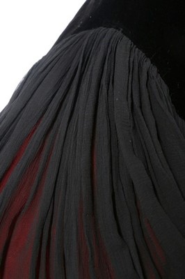 Lot 185 - A Madame Grès couture black velvet and chiffon...