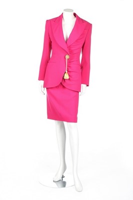 Lot 34 - A Christian Dior Boutique hot-pink wool suit,...