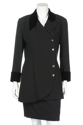 Lot 200 - A Chanel black wool suit, 1990s, Boutique...