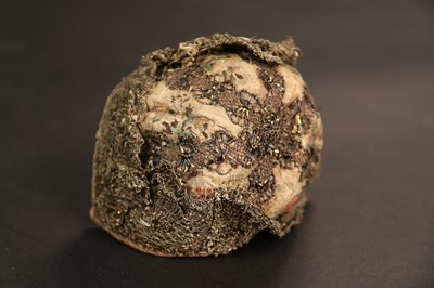 Lot 444 - A brocaded silk baby bonnet, circa 1750-60,...