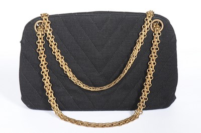 Lot 6 - A Chanel chevron quilted black jersey handbag,...