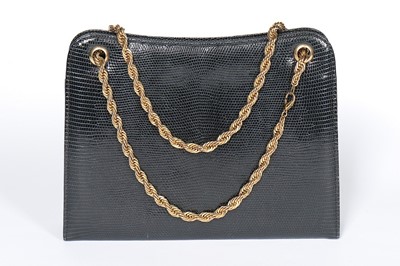 Lot 10 - A Cartier blue/black lizard handbag with...