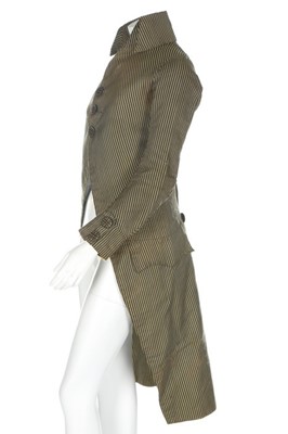 Lot 38 - A young man's striped black and yellow silk...