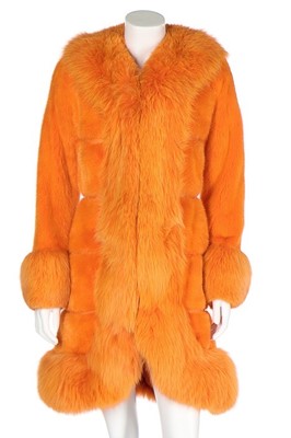 Lot 15 - A Christian Dior dyed-orange mink and fox fur...