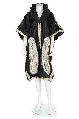 Lot 54 - A rare Lucile black satin evening cape, circa...