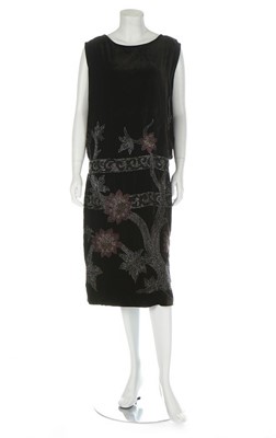 Lot 224 - An Adair beaded black velvet evening gown, mid...