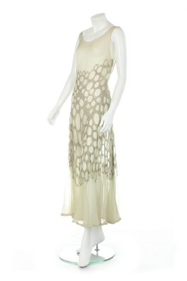 Lot 103 - A bias-cut beaded sea-foam green chiffon...