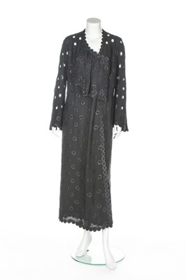 Lot 96 - An early Nina Ricci black cutwork crêpe dinner...