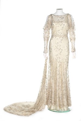 Lot 104 - A fine couture bridal gown and train, probably...