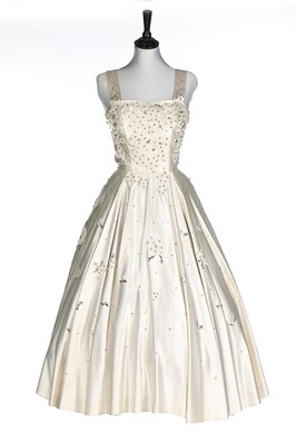 Lot 134 - A Maggy Rouff ivory satin dance/bridal gown,...