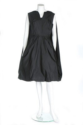 Lot 131 - A Pauline Trigère black faille cocktail dress...