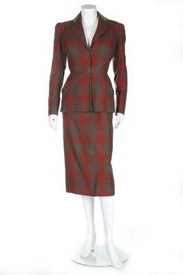 Lot 132 - A Carven couture tartan wool day suit, circa...