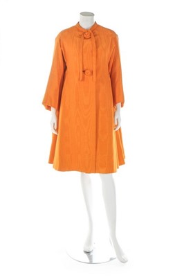 Lot 136 - A Nina Ricci couture tangerine moiré evening...