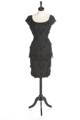 Lot 145 - A Maggy Rouff couture black lace cocktail...