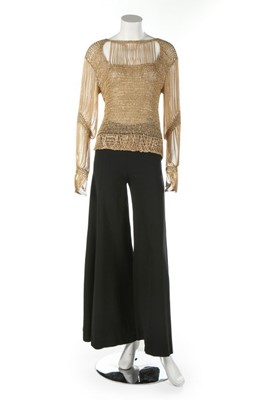 Lot 372 - A Loris Azzaro gold crochet and chain fringed...