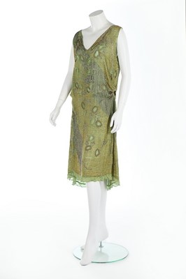 Lot 115 - A beaded green chiffon flapper dress, late...