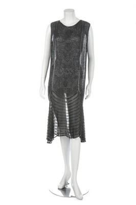 Lot 146 - A black chiffon beaded flapper dress, French,...