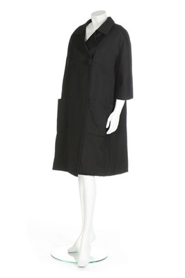 Lot 130 - A Balenciaga couture black silk faille coat,...
