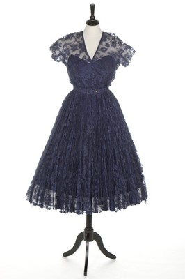 Lot 121 - A Robert Piguet couture blue lace cocktail...